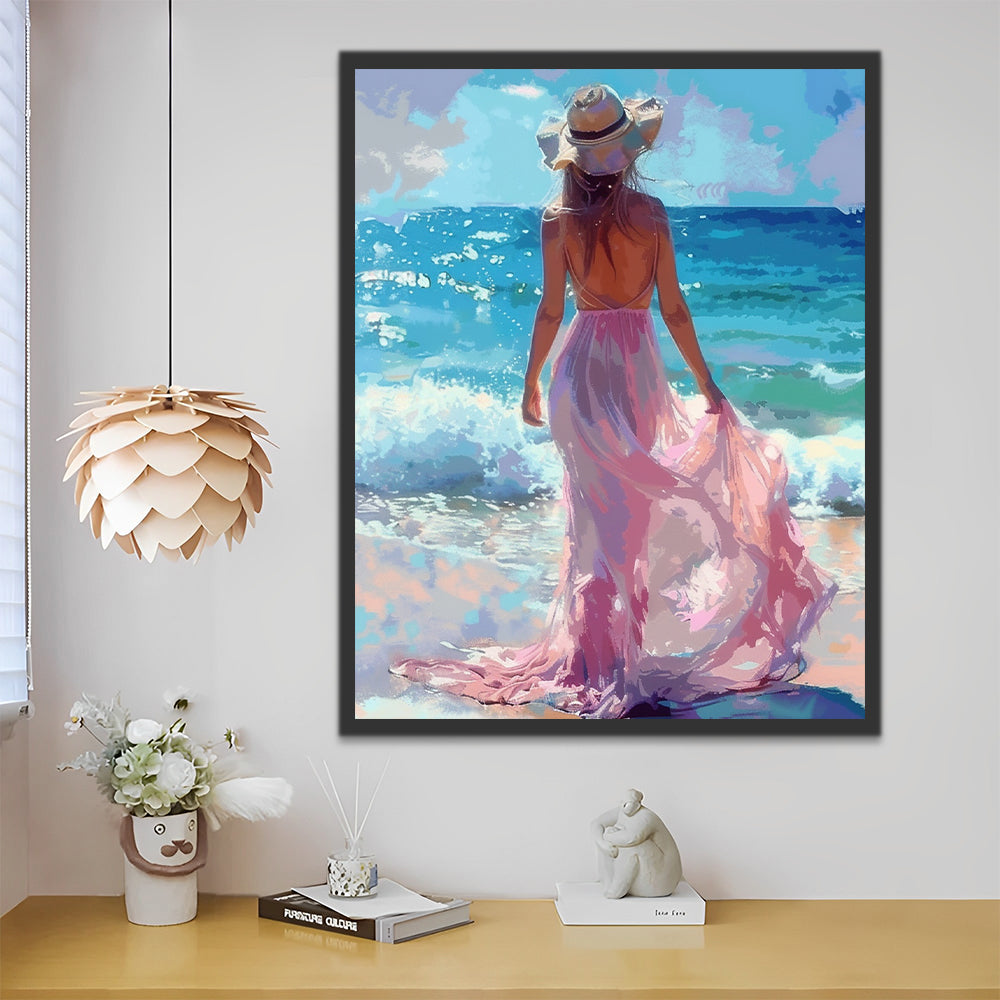 Mujer de Vestido Rosado en la Playa Mirando el Mar Azul Pintar por Números