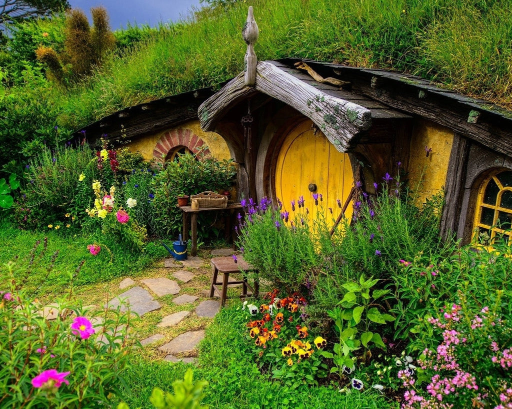 Casa Pequeña Amarilla Rodeada de Flores Pintar por Números
