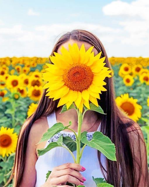Chica con Rostro Cubierto de Girasol en el Campo Pintar por Números