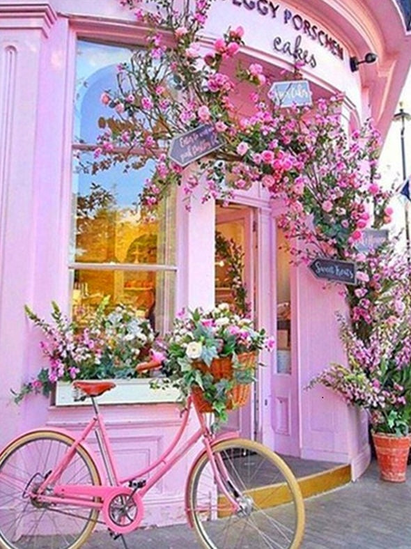 Edificio Rosado y Bicicleta con Cesta de Flores Pintar por Números
