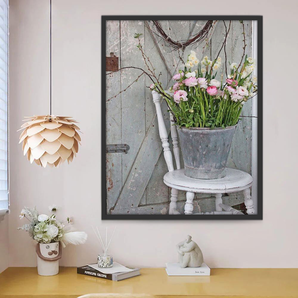 Flores en Cubo de Agua sobre Silla Blanca Pintar por Números