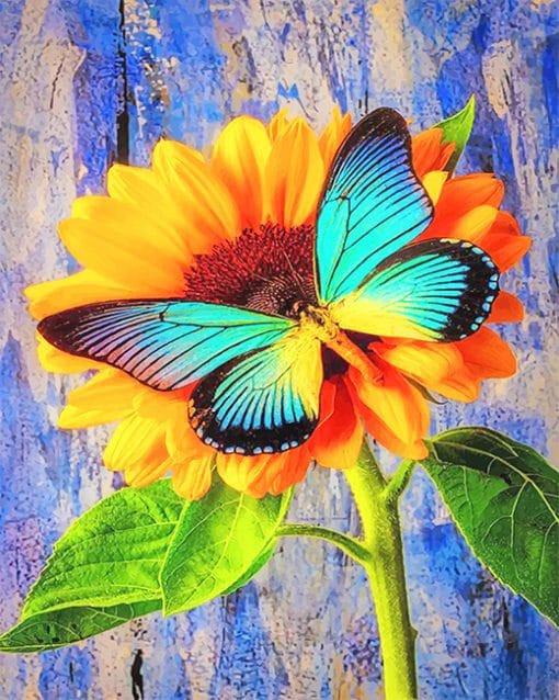 Mariposa de Color Cian sobre Girasol Pintar por Números